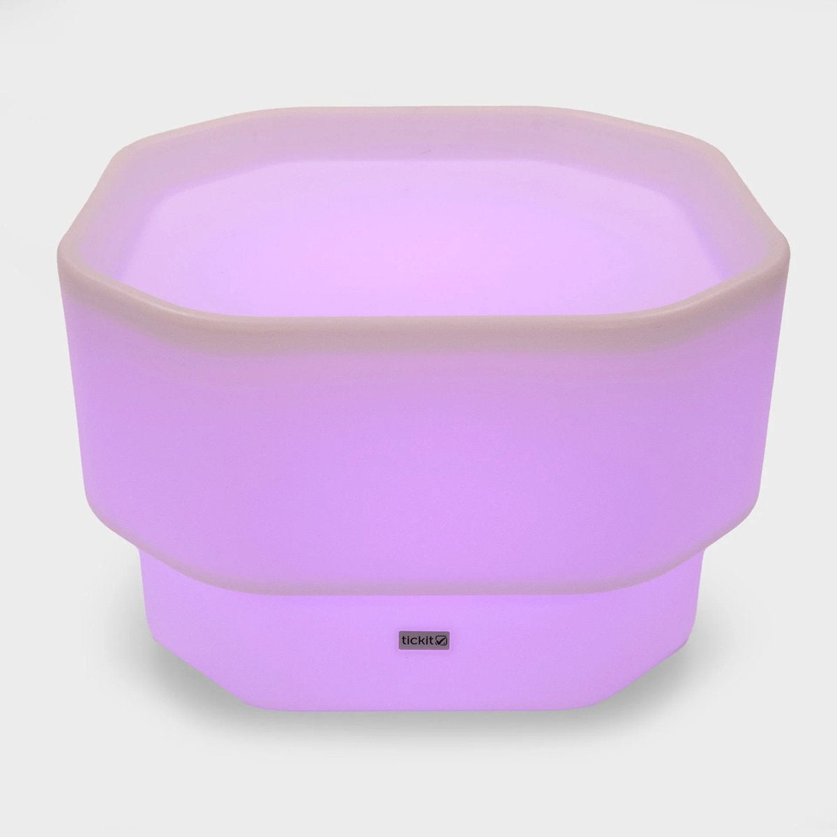 Leuchtender LED Pflanzkübel in Violett mit moderner Form für stimmungsvolle Beleuchtung im Innenbereich.