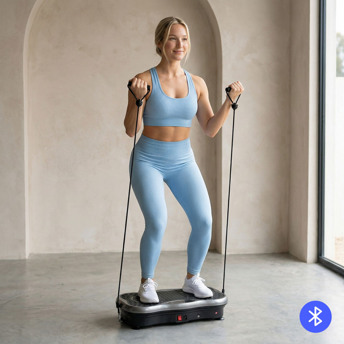 Vibrationsplatte mit Bluetooth und Widerstandsbändern für vielseitiges Ganzkörpertraining zu Hause.