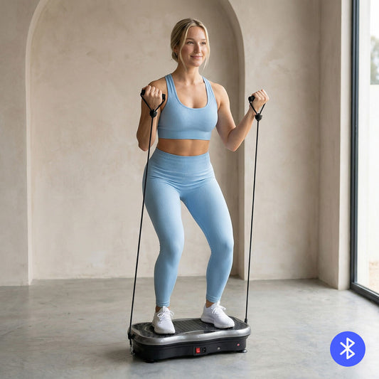 Vibrationsplatte mit Bluetooth und Widerstandsbändern für vielseitiges Ganzkörpertraining zu Hause.