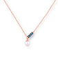 Elegante Roségold-Halskette mit Perlenanhänger und blauen Kristallen im modernen Schmuckdesign
